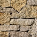 A gold and grey stone veneer perfect for any hardscape idea on the exterior or interior of any home or landscape.
