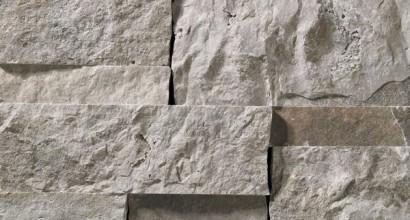 A grey stone veneer with a few lilac accents perfect for any hardscape idea on the exterior or interior of any home or landscape.