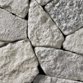 A very light grey and white webwall building stone with slightly darker grey accents perfect for any hardscape idea on the interior or exterior of the home or landscape.