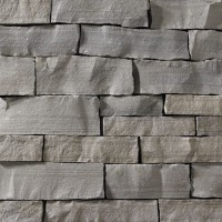 A dark, cool-grey stone veneer with neutral-grey accents perfect for any hardscape idea on the exterior or interior of any home or landscape.