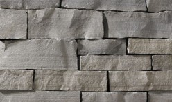 A dark, cool-grey stone veneer with neutral-grey accents perfect for any hardscape idea on the exterior or interior of any home or landscape.