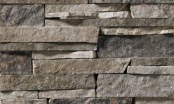 A dark stone veneer for use in interiors as well as the outdoors. This building stone features dark grays with some subtle brown accents.