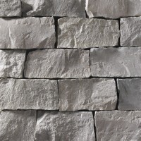A grey stone veneer perfect for any hardscape idea on the exterior or interior of any home or landscape.