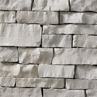 A very light grey stone veneer perfect for any hardscape idea on the exterior or interior of any home or landscape.