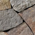 A grey, lilac, and tan colored mosaic building stone great for any hardscape idea on the interior or exterior of the home or landscape.