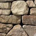 A grey and brown stone veneer with smooth edges perfect for any hardscape idea on the exterior or interior of any home or landscape.