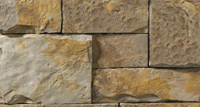 A brown, tan, and grey stone veneer with some rust-colored accents perfect for any hardscape idea on the exterior or interior of any home or landscape.