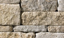 A light grey and tan stone veneer perfect for any hardscape idea on the exterior or interior of any home or landscape.
