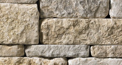 A light grey and tan stone veneer perfect for any hardscape idea on the exterior or interior of any home or landscape.