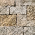 A light grey stone veneer with brown and tan accents perfect for any hardscape idea on the exterior or interior of any home or landscape.