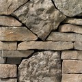 A grey and muted-brown stone veneer with very subtle tan accents perfect for any hardscape idea on the exterior or interior of any home or landscape.
