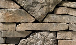 A grey and muted-brown stone veneer with very subtle tan accents perfect for any hardscape idea on the exterior or interior of any home or landscape.