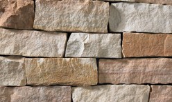 A light grey, tan, and rose-colored stone veneer perfect for any hardscape idea on the exterior or interior of any home or landscape.