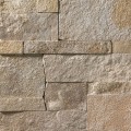 A grey and tan stone veneer with a slightly warm hue and a few rose-colored accents perfect for any hardscape idea on the exterior or interior of any home or landscape.