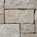 A light grey stone veneer with very subtle tan accents and a few sparse rosy hues perfect for any hardscape idea on the exterior or interior of any home or landscape.