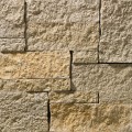 A grey and tan stone veneer perfect for any hardscape idea on the exterior or interior of any home or landscape.