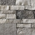 A stone veneer with a color scheme that includes a variety of greys. Perfect for any hardscape idea on the exterior or interior of any home or landscape.