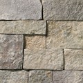 A tumbled cool-grey stone veneer with subtle tan accents perfect for any hardscape idea on the exterior or interior of any home or landscape.