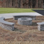 A fire pit, seat walls, and paver patio in Centerville, OH.
