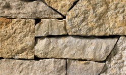 A gold and grey stone veneer perfect for any hardscape idea on the exterior or interior of any home or landscape.