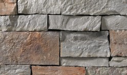 A cool grey stone veneer complimented with rose and lilac hues perfect for any hardscape idea on the exterior or interior of any home or landscape.