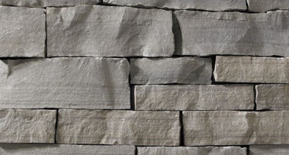 A dark, cool-grey stone veneer with neutral-grey accents perfect for any hardscape idea on the exterior or interior of any home or landscape.