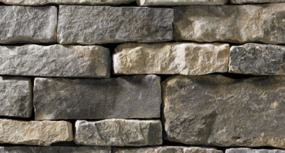 A dark grey stone veneer with light tan accents perfect for any hardscape idea on the exterior or interior of any home or landscape.