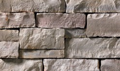 A grey stone veneer with a subtle warm hue perfect for any hardscape idea on the exterior or interior of any home or landscape.