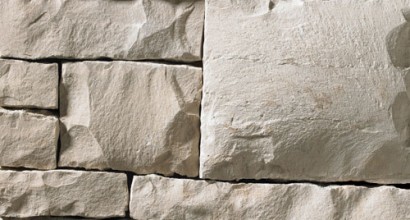 A light grey stone veneer with golden accents perfect for any hardscape idea on the exterior or interior of any home or landscape.