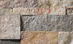 A grey and tan stone veneer with both warm and cool tones perfect for any hardscape idea on the exterior or interior of any home or landscape.
