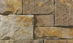 A brown, tan, and grey stone veneer with some rust-colored accents perfect for any hardscape idea on the exterior or interior of any home or landscape.