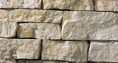 A grey and tan stone veneer with a rustic appearance perfect for any hardscape idea on the exterior or interior of any home or landscape.