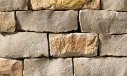 A grey and tan stone veneer perfect for any hardscape idea on the exterior or interior of any home or landscape.