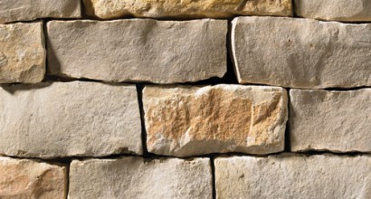 A grey and tan stone veneer perfect for any hardscape idea on the exterior or interior of any home or landscape.