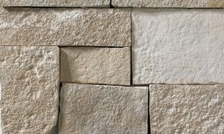A light grey stone veneer with subtle tan and lighter grey accents perfect for any hardscape idea on the exterior or interior of any home or landscape.
