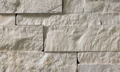 A white stone veneer perfect for any hardscape idea on the exterior or interior of any home or landscape.