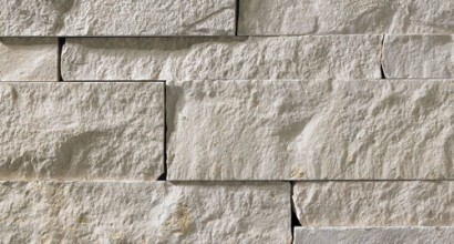 A white stone veneer perfect for any hardscape idea on the exterior or interior of any home or landscape.