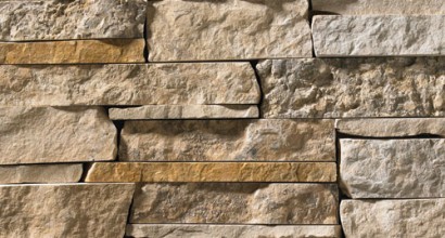 stone veneer with gold, tan, and grey tones.
