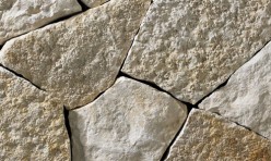 A light colored mosaic-style webwall building stone featuring white and light gray with golden and tan accents. Perfect for any idea inside or outside of the home.