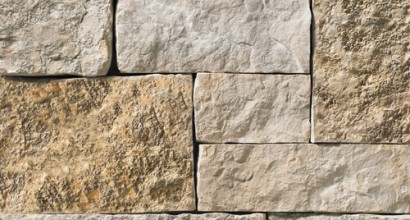 A light grey stone veneer with brown and tan accents perfect for any hardscape idea on the exterior or interior of any home or landscape.