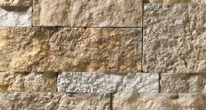 A tan and grey stone veneer perfect for any hardscape idea on the exterior or interior of any home or landscape.