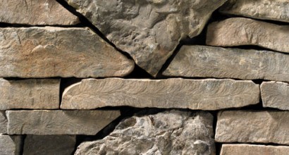 A grey and muted-brown stone veneer with very subtle tan accents perfect for any hardscape idea on the exterior or interior of any home or landscape.