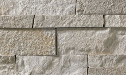A light grey stone veneer with subtle tan accents and a few areas with warmer tones perfect for any hardscape idea on the exterior or interior of any home or landscape.