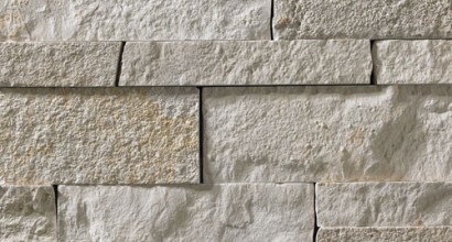 A light grey stone veneer with subtle tan accents and a few areas with warmer tones perfect for any hardscape idea on the exterior or interior of any home or landscape.