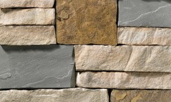 A stone veneer with light, warm hues and brown and grey modules perfect for any hardscape idea on the exterior or interior of any home or landscape.