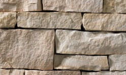 A light-colored stone veneer with a subtle warm hue and a few rose-colored accents perfect for any hardscape idea on the exterior or interior of any home or landscape.