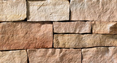 A rose-colored stone veneer perfect for any hardscape idea on the exterior or interior of any home or landscape.