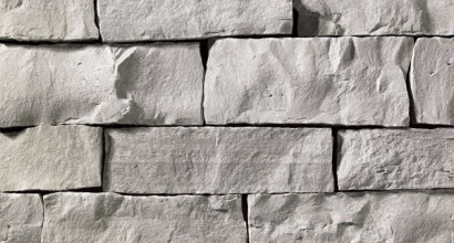 A grey stone veneer with very subtle cool hue perfect for any hardscape idea on the exterior or interior of any home or landscape.