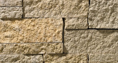 A grey and tan stone veneer perfect for any hardscape idea on the exterior or interior of any home or landscape.