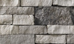 A stone veneer with a color scheme that includes a variety of greys. Perfect for any hardscape idea on the exterior or interior of any home or landscape.